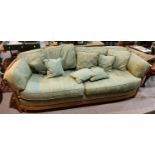 A modern Ercol light elm 3 seater settee in green stripe fabric