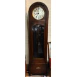 A 1930's grandfather clock in oak dome top case, with triple weight driven movement, height 194cm