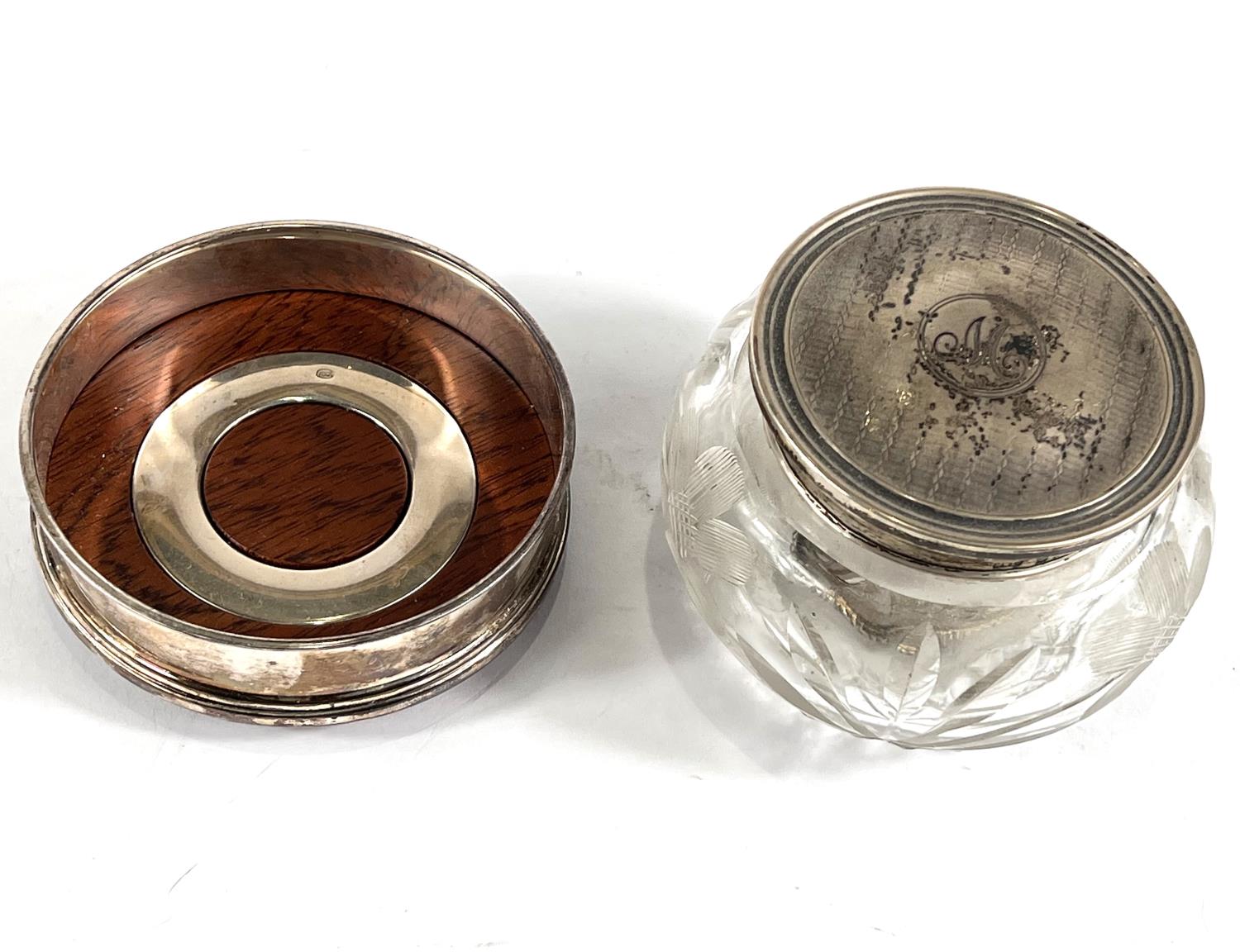 A hallmarked silver coaster by Cars, a silver lidded cut glass trinket jar and a napkin ring - Image 2 of 2