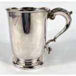 A hallmarked silver 1 pint mug on circular foot with 'S' scroll handle, monogrammed, 9.5oz.,