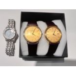 A ladies Sekonda wristwatch with quartz movement, boxed; a pair of Lobor quartz dress watches, boxed