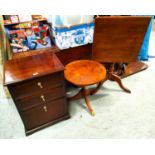 A reproduction mahogany three draw chest, a square tilt top occasional table and another table