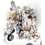 Two pairs of continental Messien style porcelain figures of couples, other similar Victorian and