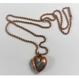 A 9 carat hallmarked gold heart locket set turquoise on rope twist chain, unmarked, tests as circa
