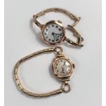 An early 19th century lady's watch in  9 carat hallmarked gold, on expanding bracelet, stamped '