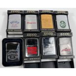 Eight various alcohol related Zippo lighters:  Jim Beam, brass, Jim Beam 200th anniversary; Jack