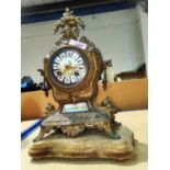 A 19th century French gilt mantel clock with painted porcelain dial, height 30cm