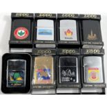 Eight various zippo lighters:  Cape Town; Hong Kong; Nicaragua; St Thomas; Gibraltar, matt black;