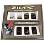 A set of 8 Zippo lighters from the 190's Vintage Aircraft set:  AGM Zero; Ju87 Stuka; FGF Hellcat;