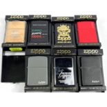 Seven various advertising Zippo lighters:  Matt red; Matt grey; gilt on black dragon, brass with