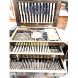 A 1920's canteen of EPNS cutlery for 12 place settings, in oak three drawer case