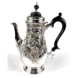 A Georgian style hallmarked silver coffee opt of baluster form with domed lid, extensive scroll