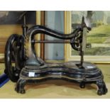 A 19th century Jones cast iron sewing machine, hand operated