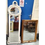 A French style white painted wall hanging mirror with oval section then long rectangular section