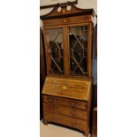 An Edwardian Sheraton style mahogany bureau bookcase with inlaid pattern and satinwood banding, 92m