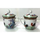 A 20th century Republic Period pair of covered cups decorated with cockerels in landscapes, height