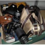 Two vintage Olympus OM10 SLR cameras; various lenses and accessories; a boxed Brownie Reflex,