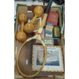 A pair of wooden dumb bells, a vintage tennis racket, a selection of vintage boxed games.