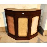 A period style mahogany bar with leather effect panels