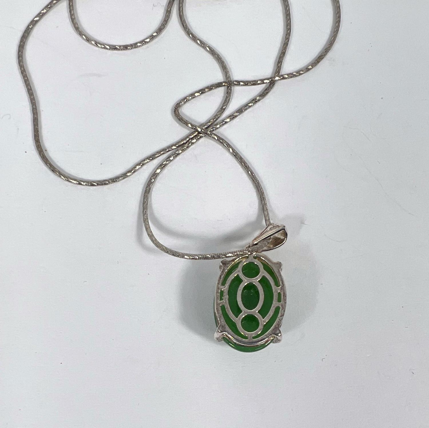 A silver necklace with jade coloured hardstone cabochon - Image 2 of 2