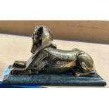 EGYPTIAN SPHINX, cast brass figure on rectangular green marble base, 15cm high, base 28 x 10cm