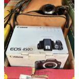 A boxed Canon EOS 450D, lenses etc