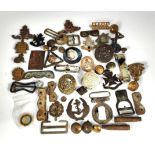 A selection of various military badges buttons etc