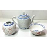 A modern Chinese blue & white teapot with inset rice grains; a modern rice bowl decorated in