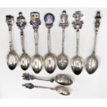 A set if three Victorian silver pieces, an anointing spoon, another longer and a pair of sugar tongs