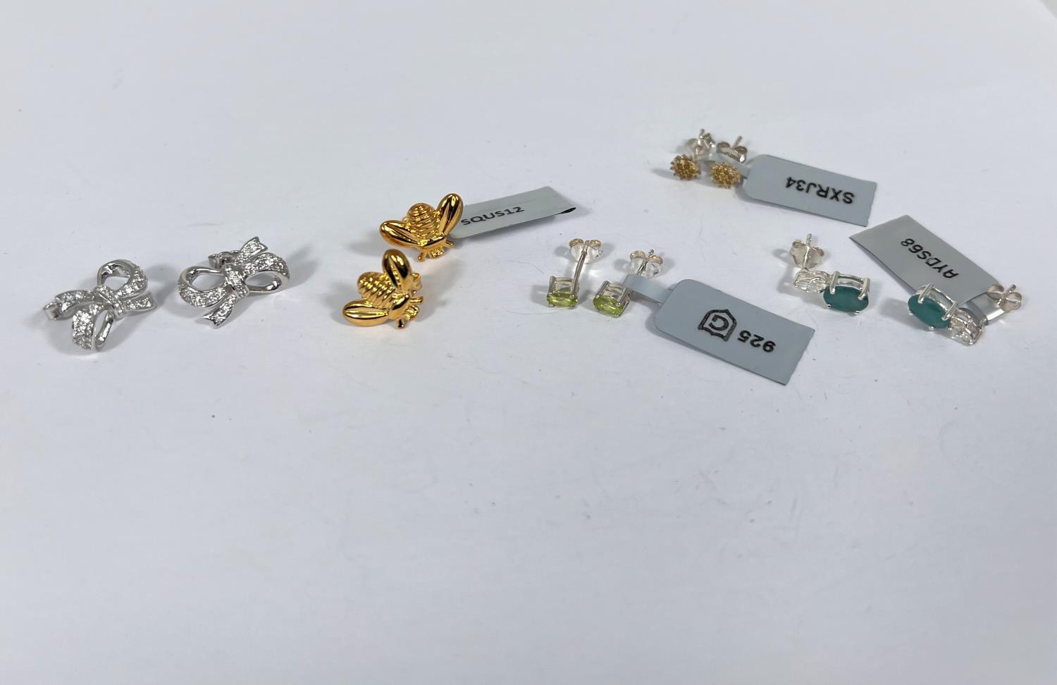 A selection of sterling silver earrings - gold tone silver bees, yellow diamonds (0.07 carats) in