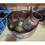A large copper oval dishes; a selection of copper dishes; a Middle Eastern vase