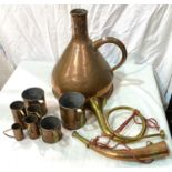 A copper conical beer jug; a set of graduating copper measures; 2 hunting horns