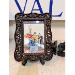 A Chinese pierced wooden picture frame with leaf and flower decoration, 24x18cm