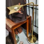 An adjustable gilt metal standard/reading lamp