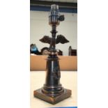 A bronze eagle table lamp with column base, height 29cm