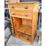 A pine side cabinet with double drawers above and shelves bellow, height 99cm, 66cm and 41cm