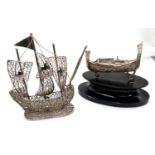A white metal filigree Viking ship on stand and another masted ship
