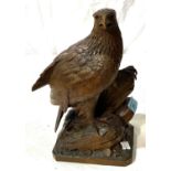 A Black Forest style carved wood eagle, height 27cm; a selection of vintage OS & Bartholomew maps