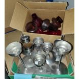 A selection 8 of Old Hall stainless steel tealights by Robert Welch, 6 with shades