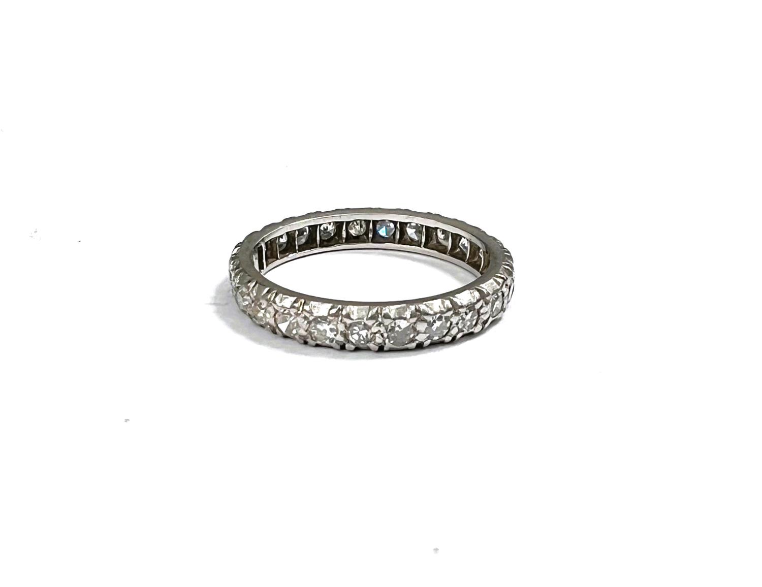 A white metal eternity ring with diamonds in illusion settings, size L, gross 3.3gm - Image 3 of 3