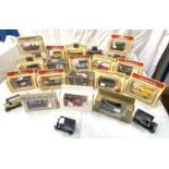 A selection of boxed Lledo Corgi and other vehicles