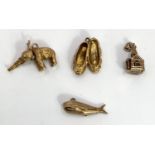 4 various 9ct hallmarked gold charms including "Jonah and the Whale" 16.5gm
