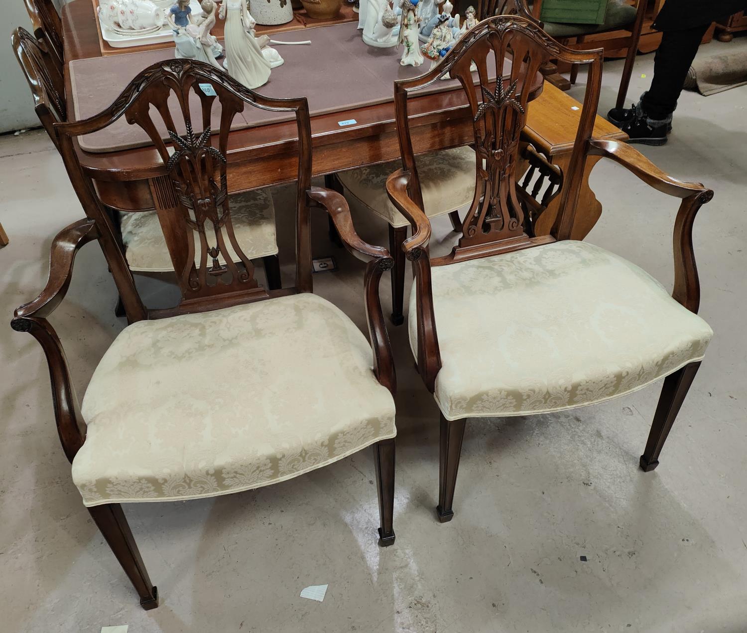 A set of 6 (4 x 2) reproduction Hepplewhite style mahogany camel back dining chairs with pierced and