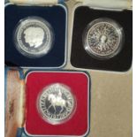 Three silver proof crowns: 1977 silver jubilee, 1980 Queen Mother's 80th birthday and 1981 Royal