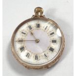 A 14ct gold open face lady's fob watch white and gilt dial Roman numerals