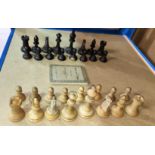 A Staunton style carved wooden chess set with weighted bases, king height 9.5cm