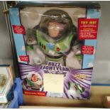 A Buzz Lightyear figure in original box (box a.f.)