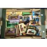 A selection of diecast boxed vehicles of various types