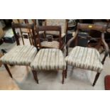 A set of 4 (3 + 1) Regency mahogany dining chairs, the overstuffed seats in striped brocade, on