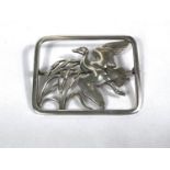 Georg Jensen:  a rectangular openwork brooch with duck flying over bulrushes, numbered 300,